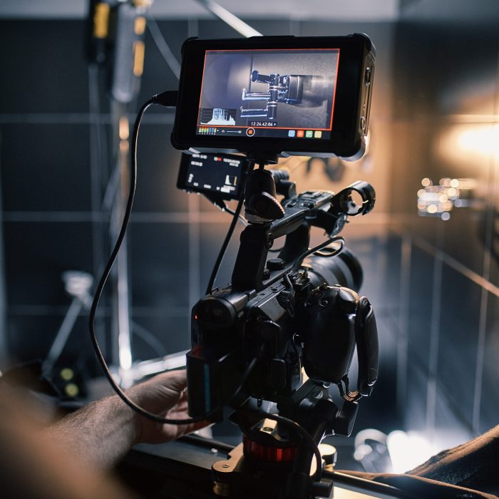 Behind the scenes of filming films or video products and the film crew of the film crew on the set in the pavilion of the film studio. Video Production Concept